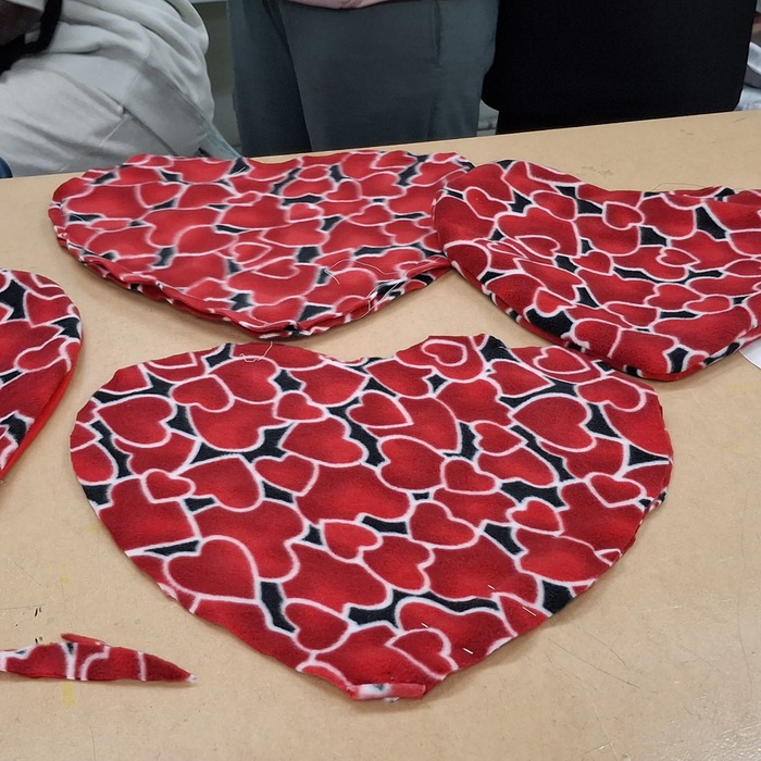 Beautiful cushions, bags, pajamas, and bear ears sewn by the students of Louis Riel School Division:  Glenlawn Collegiate, Nelson McIntyre Collegiate, Minnetonka School, Glenwood School, and Archwood School. 
